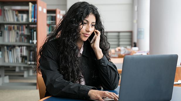 Male Student on his Laptop